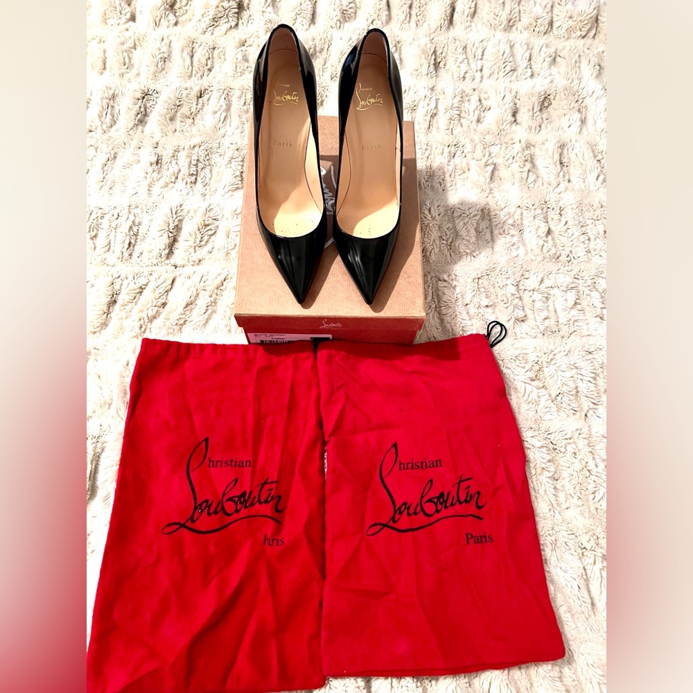 Christian Louboutin black patent leather So Kate Pumps